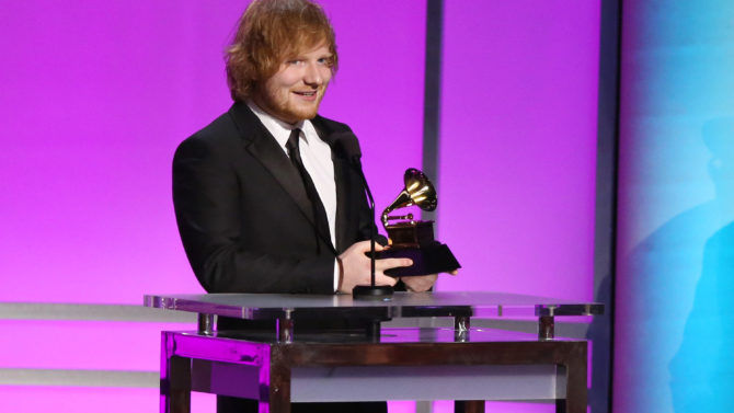 Ed Sheeran accepts the award for