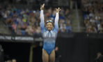 Simone Biles competes on the second