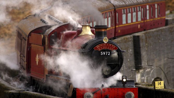 The Hogwart Express Steam Train crosses